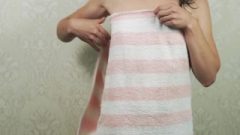Slim Female Dropping Her Towel Revealing Petite Breasts Shaved Twat